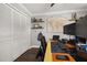 Comfortable home office featuring built in storage and decorative shelving at 694 Tuscora Dr, Winter Springs, FL 32708