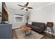 Cozy living room featuring a comfortable couch, modern decor, and stylish furnishings at 694 Tuscora Dr, Winter Springs, FL 32708