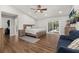Primary bedroom with vaulted ceiling, ceiling fan, and sliding glass doors to the pool at 694 Tuscora Dr, Winter Springs, FL 32708