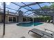 Screened pool area with lounge chairs and patio, ideal for enjoying outdoor living and recreation at 694 Tuscora Dr, Winter Springs, FL 32708