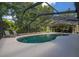 Lovely screened-in pool offers a refreshing oasis for leisure and recreation in a secluded backyard at 694 Tuscora Dr, Winter Springs, FL 32708