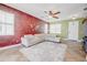 Cozy living room leading into the dining area, showcasing spacious layout, with natural light and tile flooring at 7348 Yoder St, Windermere, FL 34786
