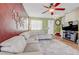 Spacious living room with tile flooring, a comfortable sofa, and modern decor, great for relaxing or entertaining at 7348 Yoder St, Windermere, FL 34786