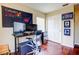 Office with hardwood floors, a closet, and a view from the window at 7348 Yoder St, Windermere, FL 34786