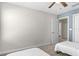 Comfortable bedroom with a ceiling fan and adjacent closet access at 740 Simone Ct, Haines City, FL 33844