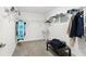 Walk-in closet with wire shelving and soft carpet floors at 740 Simone Ct, Haines City, FL 33844