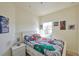 Bedroom featuring a bed with superhero-themed linens and decor at 7505 Pellham Way, Kissimmee, FL 34747