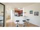 Clean and modern kitchen area with a breakfast bar and stainless steel appliances at 7505 Pellham Way, Kissimmee, FL 34747