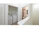 Laundry closet featuring washer and dryer off of bathroom at 7505 Pellham Way, Kissimmee, FL 34747