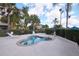 Community pool featuring seating and lounge chairs at 7505 Pellham Way, Kissimmee, FL 34747