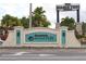 Oakwater Magic Tree Resort community sign creates a welcoming entrance to the neighborhood at 7505 Pellham Way, Kissimmee, FL 34747