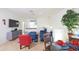 Spacious living area with a dining table and cozy sitting area, perfect for relaxing at 7505 Pellham Way, Kissimmee, FL 34747