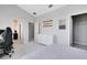 Bedroom featuring a dresser and views to an adjacent closet and bathroom at 8263 Bellow St, Orlando, FL 32827