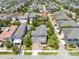 Aerial view of home, showing the neighborhood, mature landscaping, and location within the community at 8263 Bellow St, Orlando, FL 32827