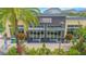 Exterior of a fitness center featuring landscaping and ample parking at 8263 Bellow St, Orlando, FL 32827