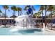 Community splash pad area featuring a large water bucket and lounge seating at 8263 Bellow St, Orlando, FL 32827