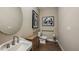 Cozy bathroom features a tile floor, a vanity, and brushed nickel fixtures and accents at 857 Junonia Blvd, New Smyrna Beach, FL 32168