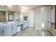 Spacious bathroom with double sinks, light gray cabinetry, and lots of counter space at 857 Junonia Blvd, New Smyrna Beach, FL 32168