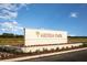 Entrance to Ardisia Park features a beautifully landscaped sign showcasing the community's name at 857 Junonia Blvd, New Smyrna Beach, FL 32168