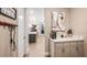 Inviting hallway nook featuring a coffee bar, stylish decor, and access to the rest of the home at 857 Junonia Blvd, New Smyrna Beach, FL 32168