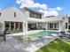 Stunning backyard featuring a pool, spacious patio, and well-manicured lawn at 9364 Thurloe Pl, Orlando, FL 32827