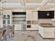 Spacious kitchen featuring custom cabinets, marble countertops, and stainless steel appliances at 9364 Thurloe Pl, Orlando, FL 32827