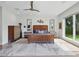 Cozy main bedroom with decorative rug, wood bed frame, and dresser at 9364 Thurloe Pl, Orlando, FL 32827