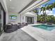 Inviting outdoor patio with stylish furniture, perfect for entertaining by the pool at 9364 Thurloe Pl, Orlando, FL 32827