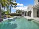 Beautiful pool surrounded by lush landscaping, and offers a serene retreat at 9364 Thurloe Pl, Orlando, FL 32827