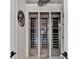 Built in wine coolers offer ample storage for bottles and climate control at 9364 Thurloe Pl, Orlando, FL 32827