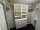 Spacious walk-in closet with custom shelving and ample storage space at 10414 Andover Point Cir, Orlando, FL 32825