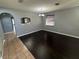 Elegant dining room with dark floors, modern lighting, and an open layout at 10414 Andover Point Cir, Orlando, FL 32825
