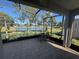 Relaxing screened-in patio with views of the lake at 10414 Andover Point Cir, Orlando, FL 32825