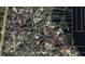 Aerial view of a waterfront community with large lots and mature trees at 11056 Clipper Ct, Windermere, FL 34786
