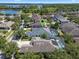 Aerial view of the home and neighborhood near a lake at 11407 Wakeworth St, Orlando, FL 32836