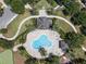 Overhead view of the community pool highlighting the layout, landscaping, and surrounding walking paths at 11407 Wakeworth St, Orlando, FL 32836