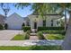 Charming two-story home with a well-manicured lawn at 11407 Wakeworth St, Orlando, FL 32836