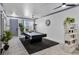 Spacious game room with a pool table, stylish decor, and neutral color palette at 11407 Wakeworth St, Orlando, FL 32836