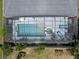 Aerial view of the screened-in pool and jacuzzi at 11407 Wakeworth St, Orlando, FL 32836