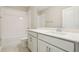 Bathroom featuring a shower, vanity and countertop at 11941 Bracco St, Winter Garden, FL 34787