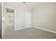 Inviting bedroom featuring neutral walls and doors to adjacent rooms at 11941 Bracco St, Winter Garden, FL 34787