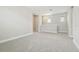 Carpeted loft area featuring neutral walls, recessed lighting and multiple windows providing ample light at 11941 Bracco St, Winter Garden, FL 34787