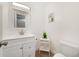 Clean, well-lit bathroom with a white vanity and modern fixtures at 12133 Augusta Woods Cir, Orlando, FL 32824