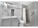 Modern bathroom with a walk-in shower and stylish tile at 12133 Augusta Woods Cir, Orlando, FL 32824
