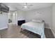 Cozy bedroom with a ceiling fan and ensuite bathroom at 12133 Augusta Woods Cir, Orlando, FL 32824