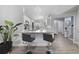 Open kitchen area with a granite countertop and bar seating at 12133 Augusta Woods Cir, Orlando, FL 32824