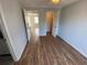 Bedroom with wood-look flooring and walk-in closet at 122 Water Front Way # 360, Altamonte Springs, FL 32701