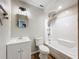 Bathroom featuring a tub with shower, new vanity and wood-look floors at 130 Aragon Ave, Umatilla, FL 32784