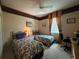 Bedroom offers a comfortable space with a ceiling fan, and a window for natural light at 13250 Meergate Cir, Orlando, FL 32837