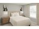 Comfortable bedroom with a soft color palette, natural light, and modern decor at 13271 Pergola Ave, Orlando, FL 32832